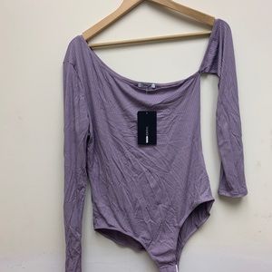 Never worn fashion nova Bodysuit